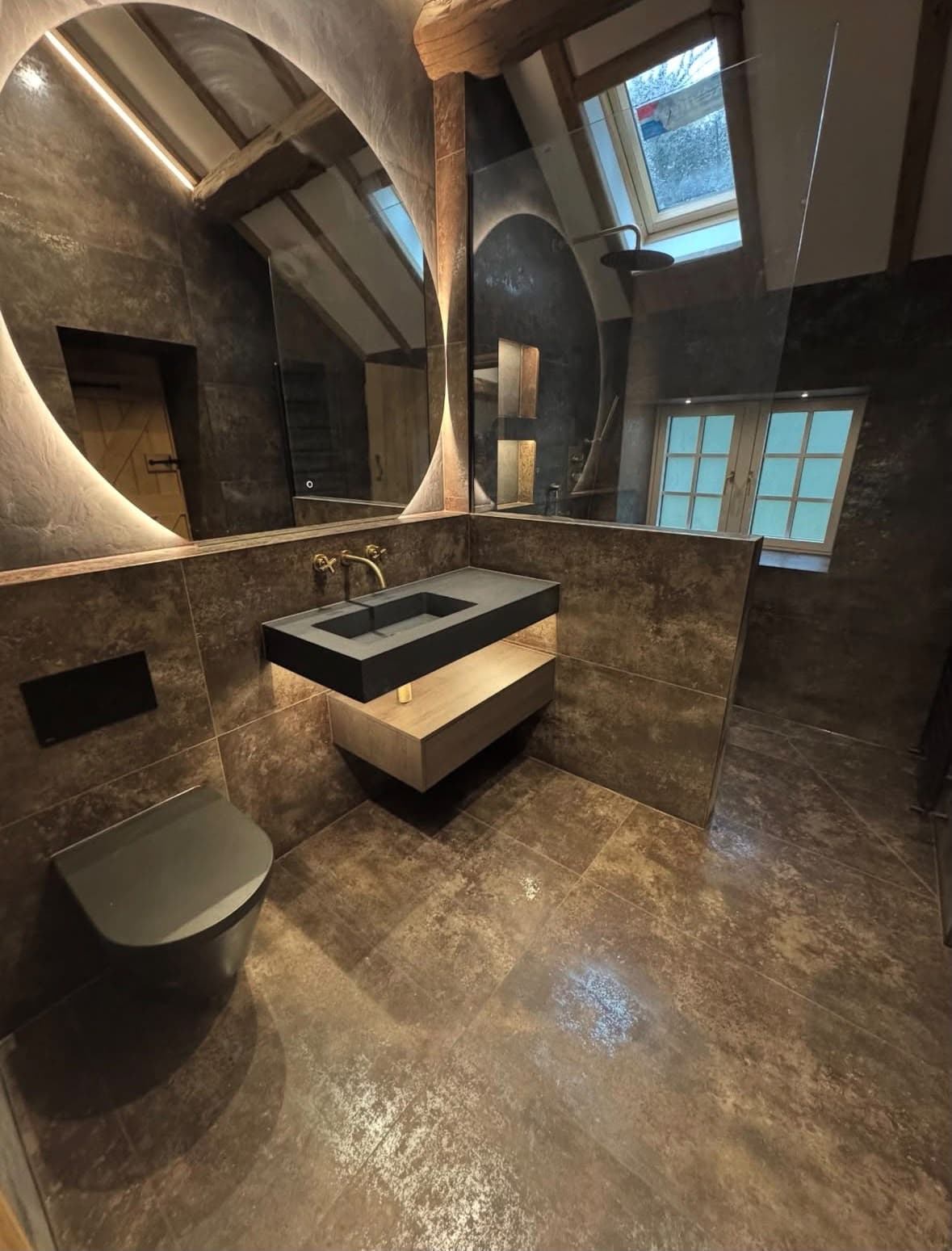 A bathroom cleaned to a shine, tiles and fixtures spotless