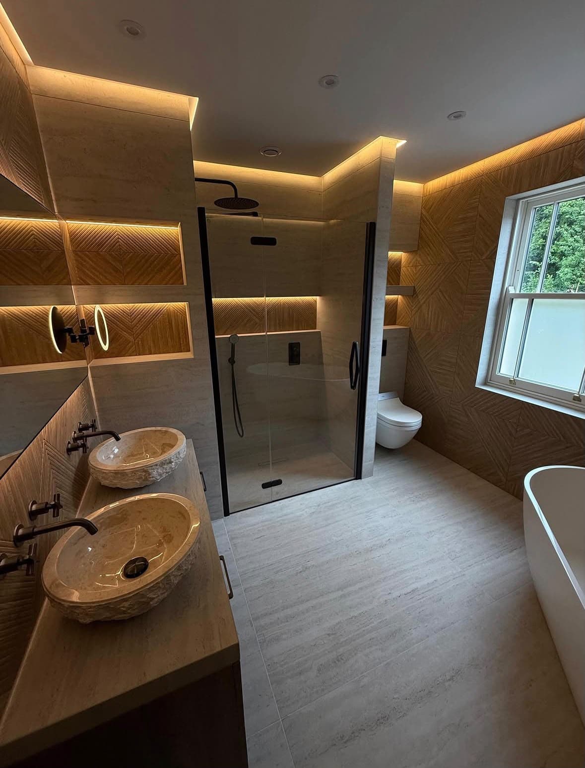 A bathroom and shower area cleaned and finished