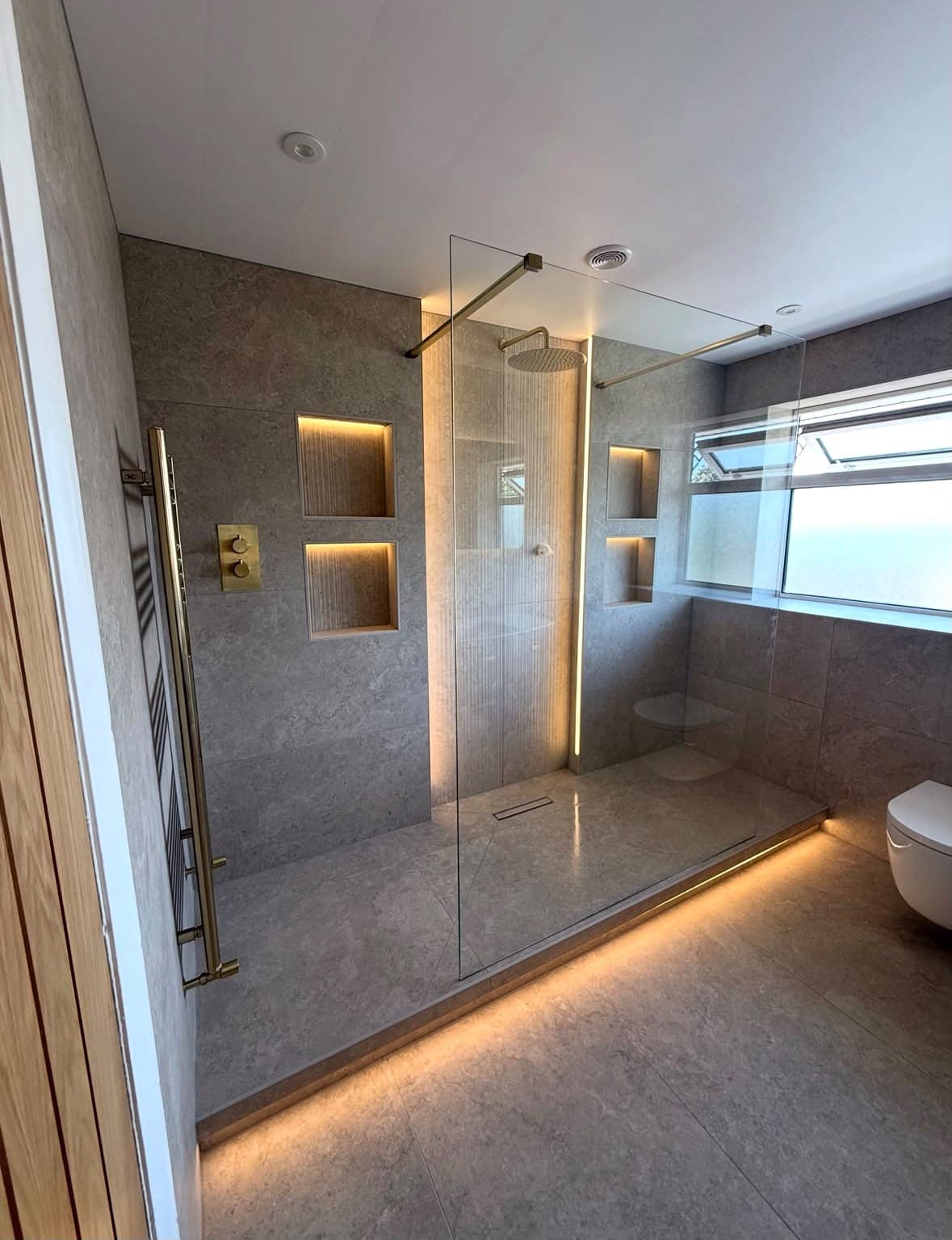 A walk-in shower cleaned and finished